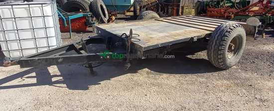 Plataforma porta-máquina basculante