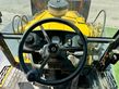 Retro Mixta Cargadora New Holland B110 4PT. 