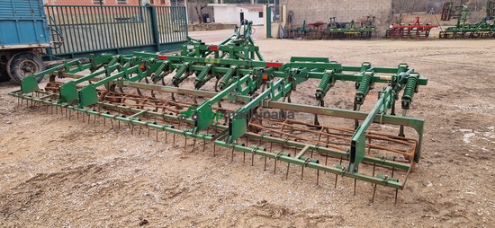 Cultivador - 25 brazos con rastra 