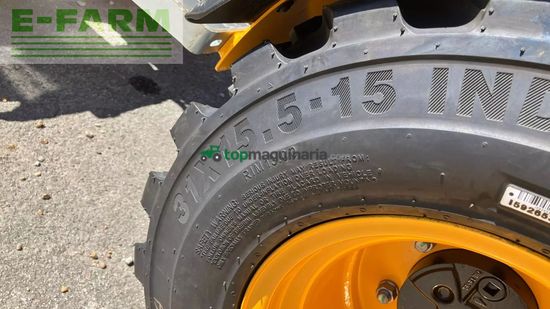 Minicargadora - JCB - 403 plus agri med jst skovl og pallegaffel