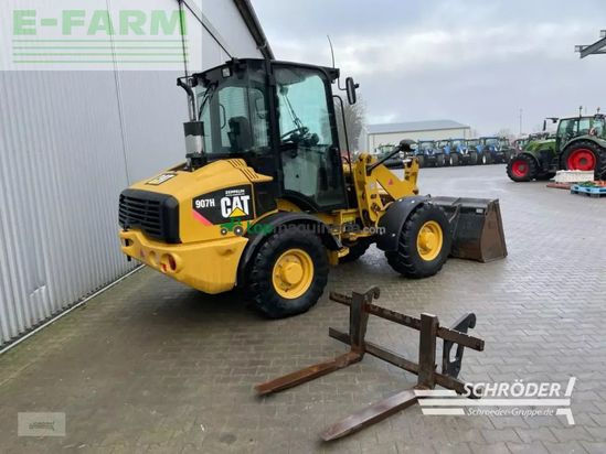 Minicargadora - Caterpillar - 907 h + schaufel + palettengabel