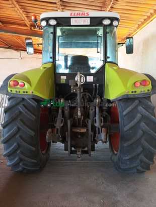 Tractor agrícola - Claas ARION 610  con Pala tenías 