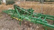 Cultivador - 25 brazos con rastra 