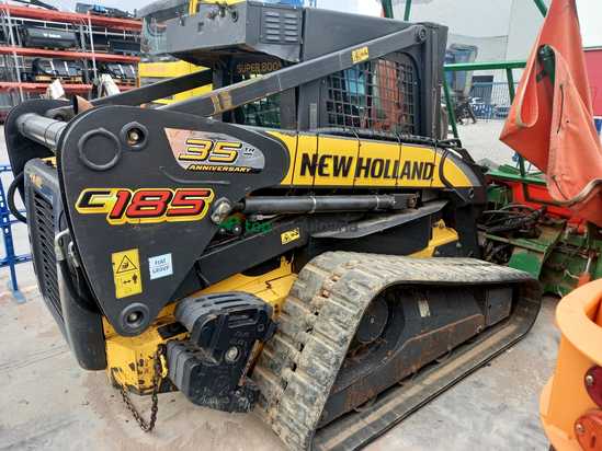 CARGADORA COMPACTA ORUUGAS  - C185 NEW HOLLAND