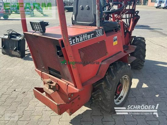 Telescopica - Schaffer - 330 + schaufel + palettengabel + zange