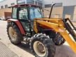 Tractor agrícola - New Holland - L95 con pala Tenias