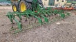 Cultivador - 25 brazos con rastra 