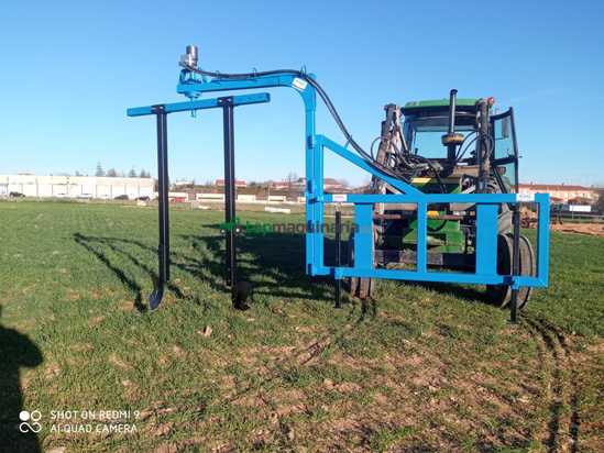 Máquina de pozas acoplada a pala