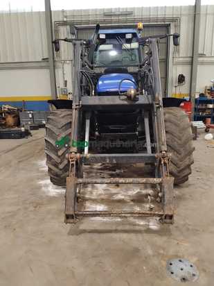 Tractor agrícola - New Holland - MODELO TM135 CON PALA TENIAS SERIE 300