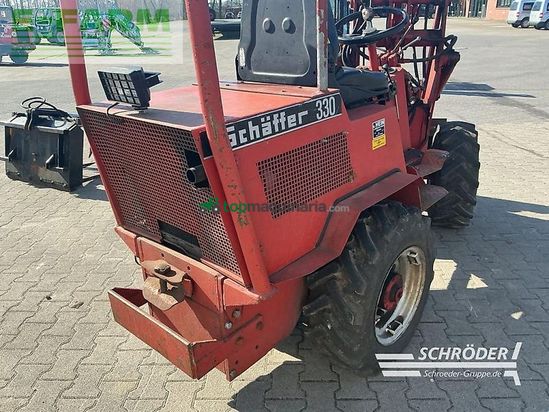 Minicargadora - Schaffer - 330 + schaufel + palettengabel + zange