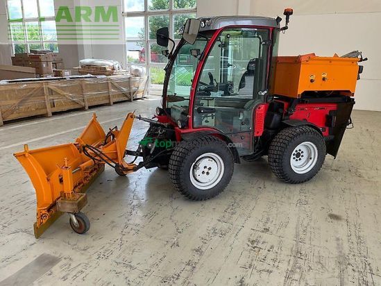 Tractor agrícola -  - sp 4400 inkl. schild mit pflug und streuer