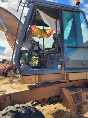 Retroexcavadora Case Giratoria de ruedas modelo 1188