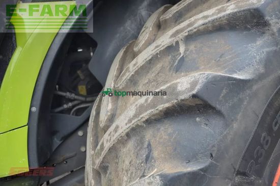 Esparcidor - Claas - xerion 4200 saddle trac bauer