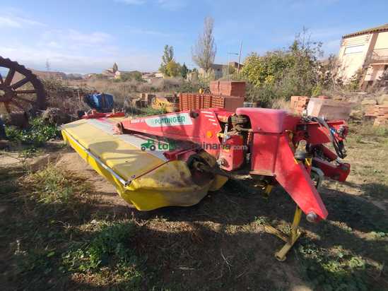 Segadora trasera Pottinger modelo Novacat 352 RCB con acondicionador