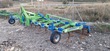 Cultivador - 23 brazos con rodillo y rastra 
