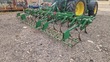 Cultivador - 25 brazos con rastra 