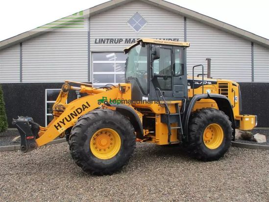 Minicargadora - Hyundai - 757-9a med 620/75r26 traktor hjul montering på