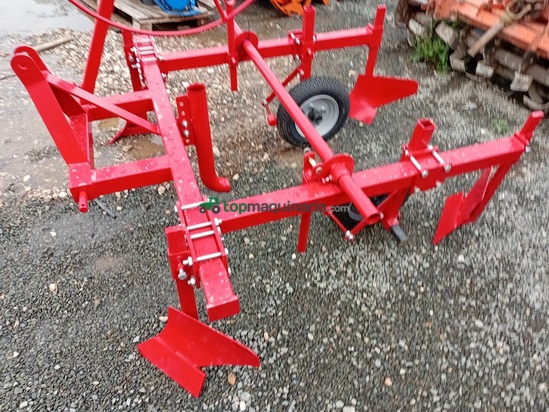 MAQUINA PARA PONER PLASTICO Y GOTEO. 