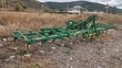 Cultivador - 25 brazos con rastra 