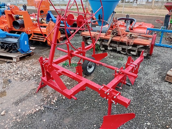 MAQUINA PARA PONER PLASTICO Y GOTEO. 