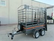 Remolque  caja fija 2 ejes con freno 2200x1300x500+1100+arquillos