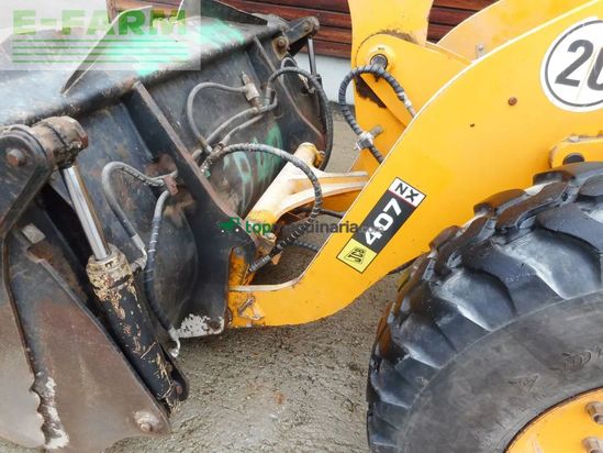 Minicargadora - JCB - 407 ( 5.400kg ) mit schaufel + gabel