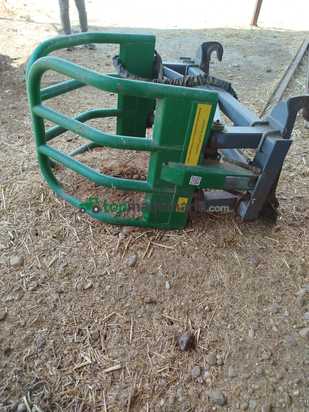 Pinza recoge bolos