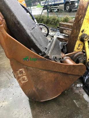 Excavadora NEW HOLLAND MH PLUS