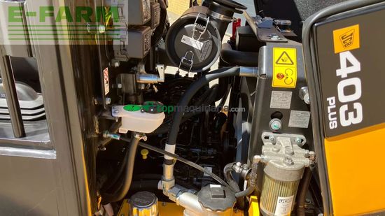 Minicargadora - JCB - 403 plus agri med jst skovl og pallegaffel