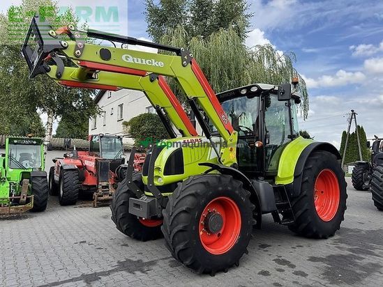 Tractor agrícola - Claas - arion 640 cis + quicke q65 CIS