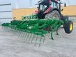 Cultivador Gil de 21 brazos con rastra de muelles