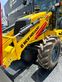 Retro Mixta Cargadora New Holland B110 4PT. 