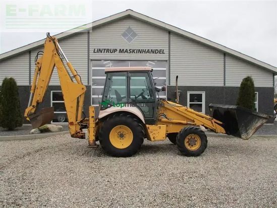 Excavadora - New Holland - nh 95 ps med stor frontskovl