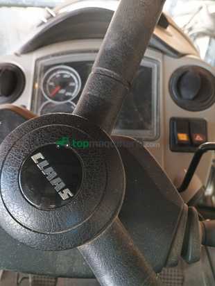 Tractor agrícola - Claas ARION 610  con Pala tenías 