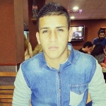 Christian Espinoza, Passejador de gossos a Valencia