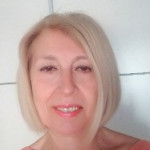 Rosa Moguel, Limpiadora en Sevilla