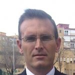 Juan Andres Gonzalez, Professor d'informàtica a Sevilla