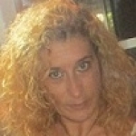 Conchi Scrofano, Passejadora de gossos a Massanassa