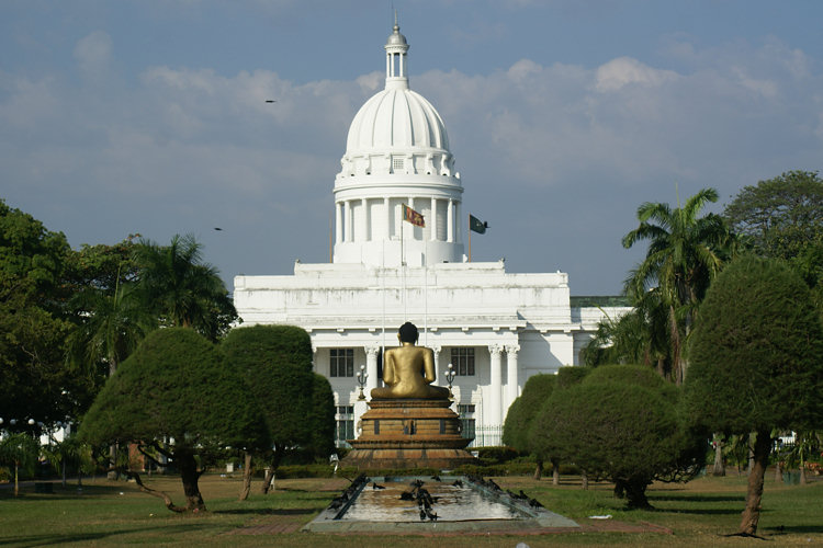 Colombo City Council Town Hall viewed from old Victoria Park with the Buddha Statue Colombo City Council Town Hall