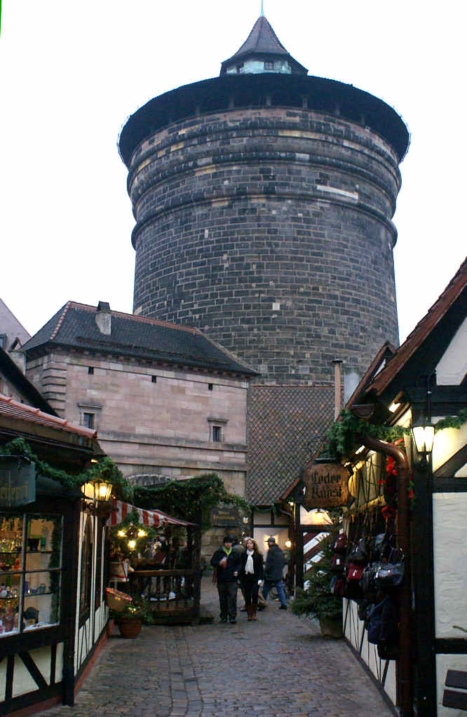 Konigstor city wall castle tower called the Dicker Turm or fat tower Craftsmen’s Courtyard Handwerkerhof Christmas Market