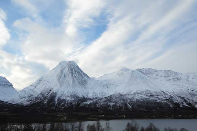 picture of the arctic mountains around the fjord near Tromso in Norway arctic mountains around the fjord