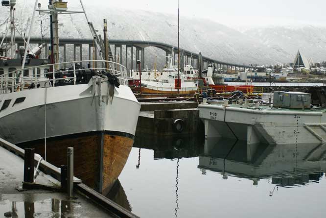 Picture of Tromso harbour and the bridge that leads to the Artic Cathedral on the far side of the fjord Artic Cathedral norway