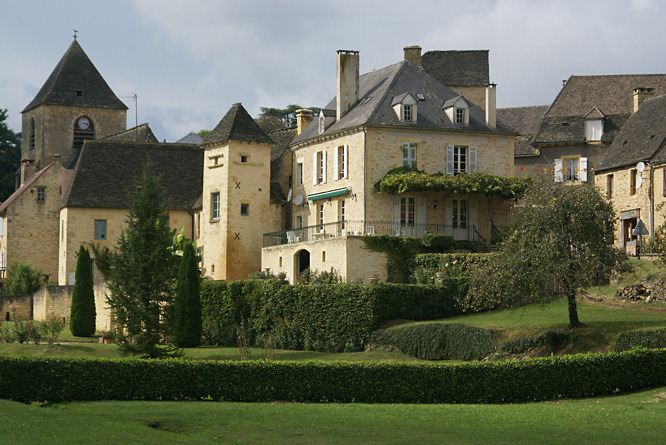 Photo of the attractive charming village of Saint-Geniès in the Dordogne, France Saint-Genies