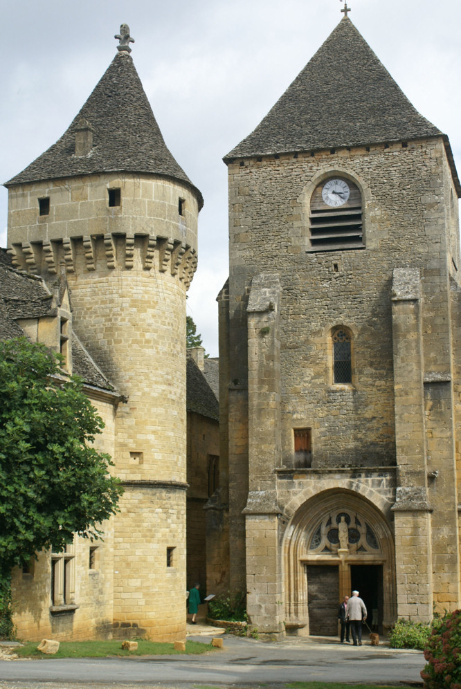 Photo of the attractive chateau and church in the charming village of Saint-Genies in the Dordogne Saint-Genies castle and church
