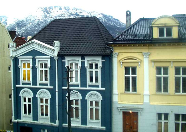 The south west arm of the Port of Bergen in Norway is covered with brightly painted charming houses brightly painted charming houses in Bergen Norway