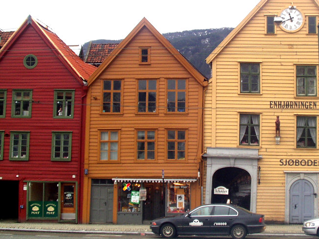 traditional paint colours are still used to protect the outside wood of these historic warehouses in Bergen Harbour Norway Bergen Harbour Norway