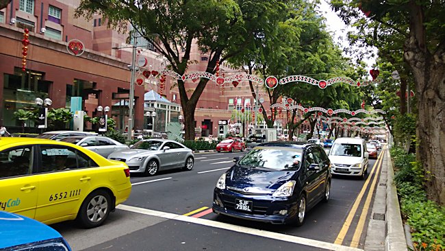 The tree lined Orchard Road, Singapore's main shopping Street Singapore shopping Street