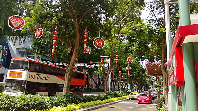 The bus and taxis of Orchard Road main shopping street in Singapore Singapore Orchard Road