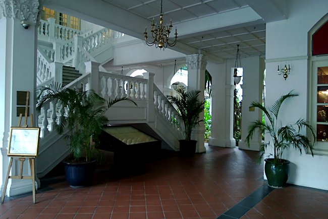 One of the many elegant staircases in Raffles Hotel Raffles Hotel interior