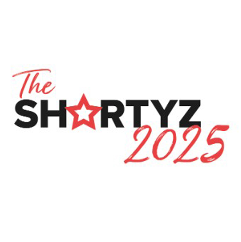 Red and black writing on a white background. Text reads: The Shortyz 2025.